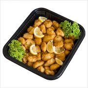 Battered crispy fried fish pieces with lemon wedges and curly lettuce in an iDoCatering black catering tray