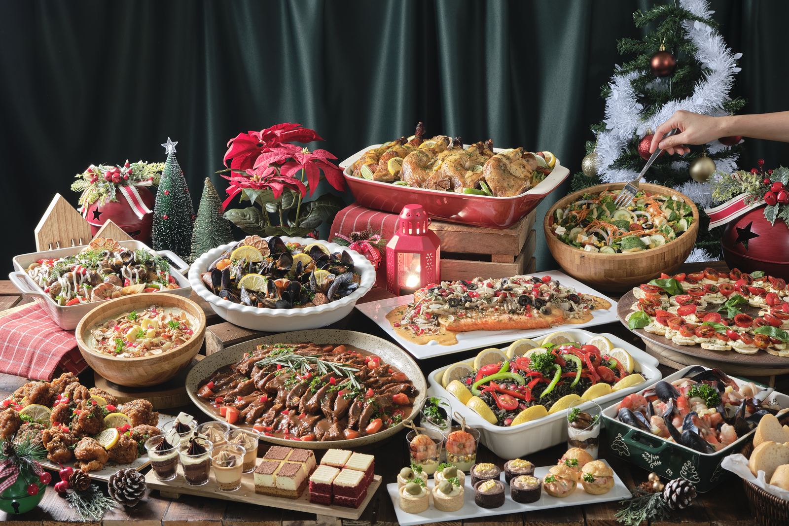 Full iDoCatering Christmas buffet table of roast chicken, seafood, brisket, flatbreads, salads and desserts