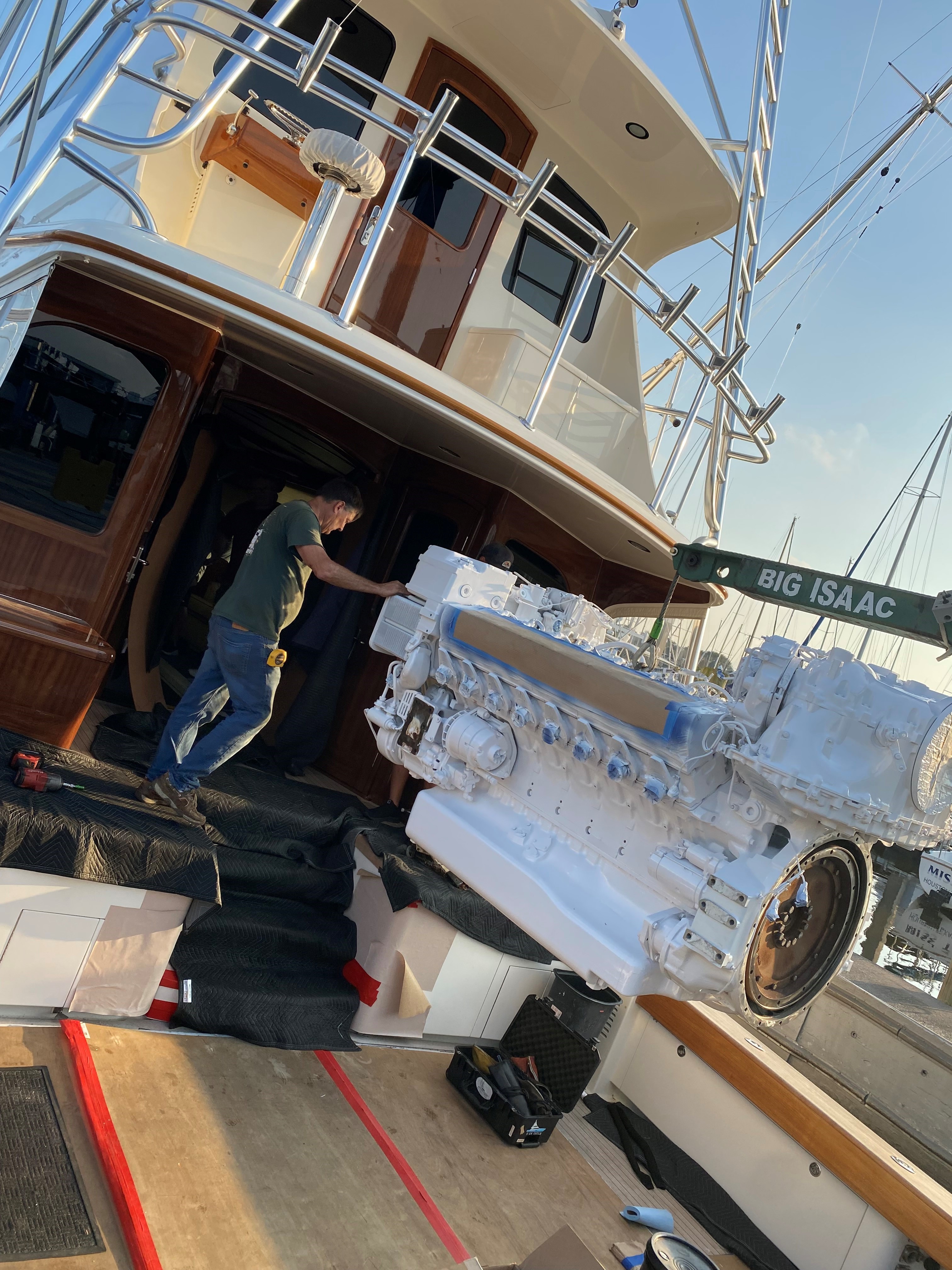 New marine engine being lowered into a vessel