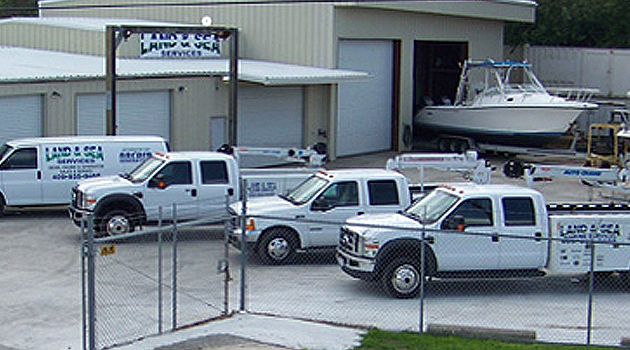 Land & Sea service trucks at the La Marque shop