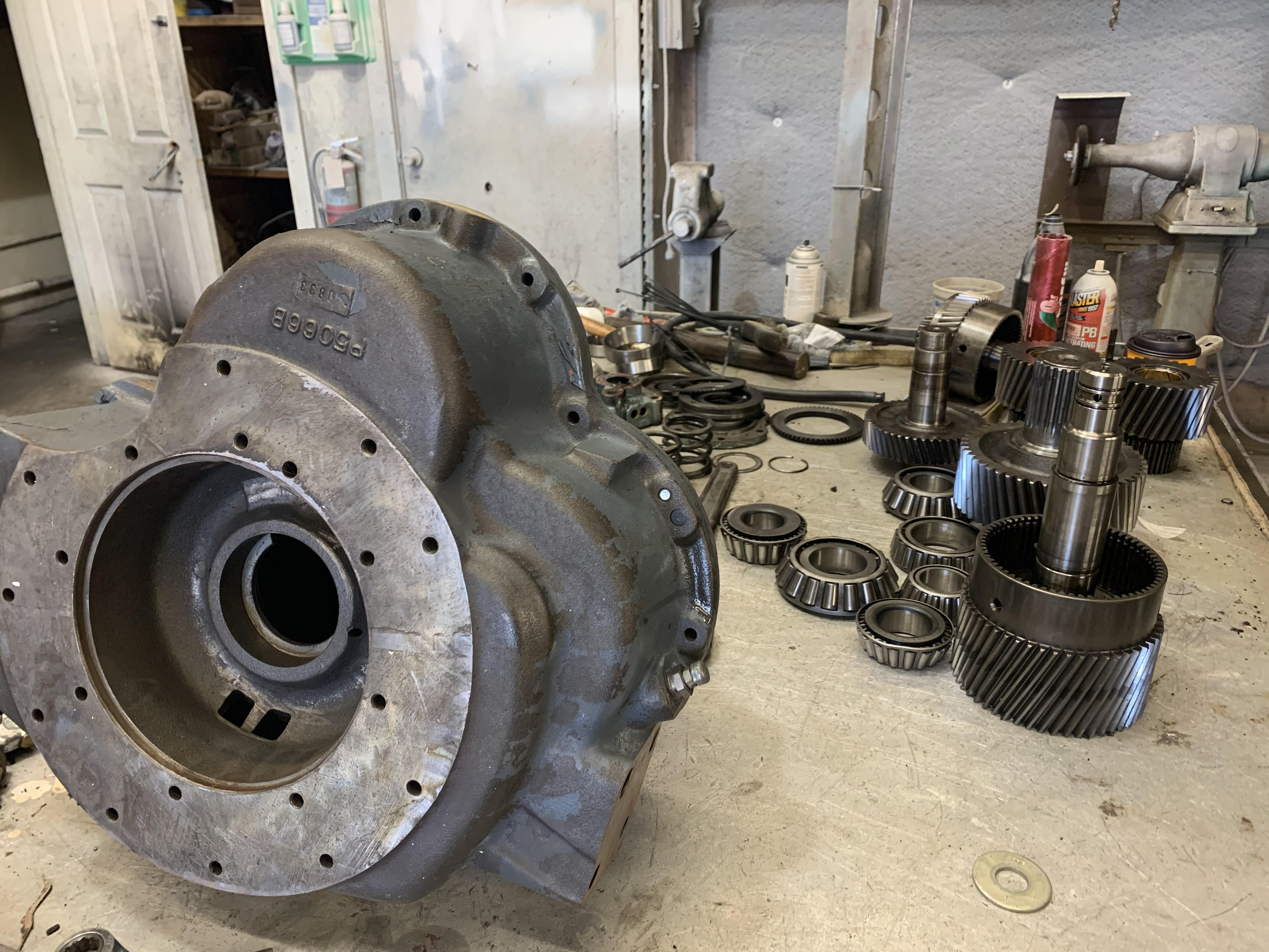 Marine transmission disassembled on a shop bench
