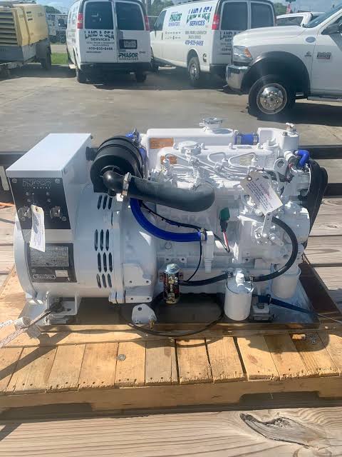 Generator and engine installed in a boat engine room
