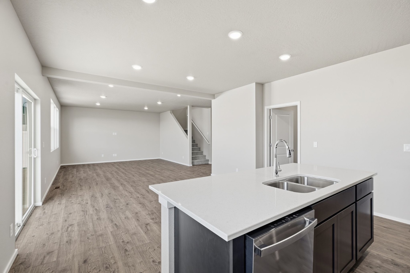 The upstairs loft in a Phoenix plan home, an open landing sitting between the bedrooms.