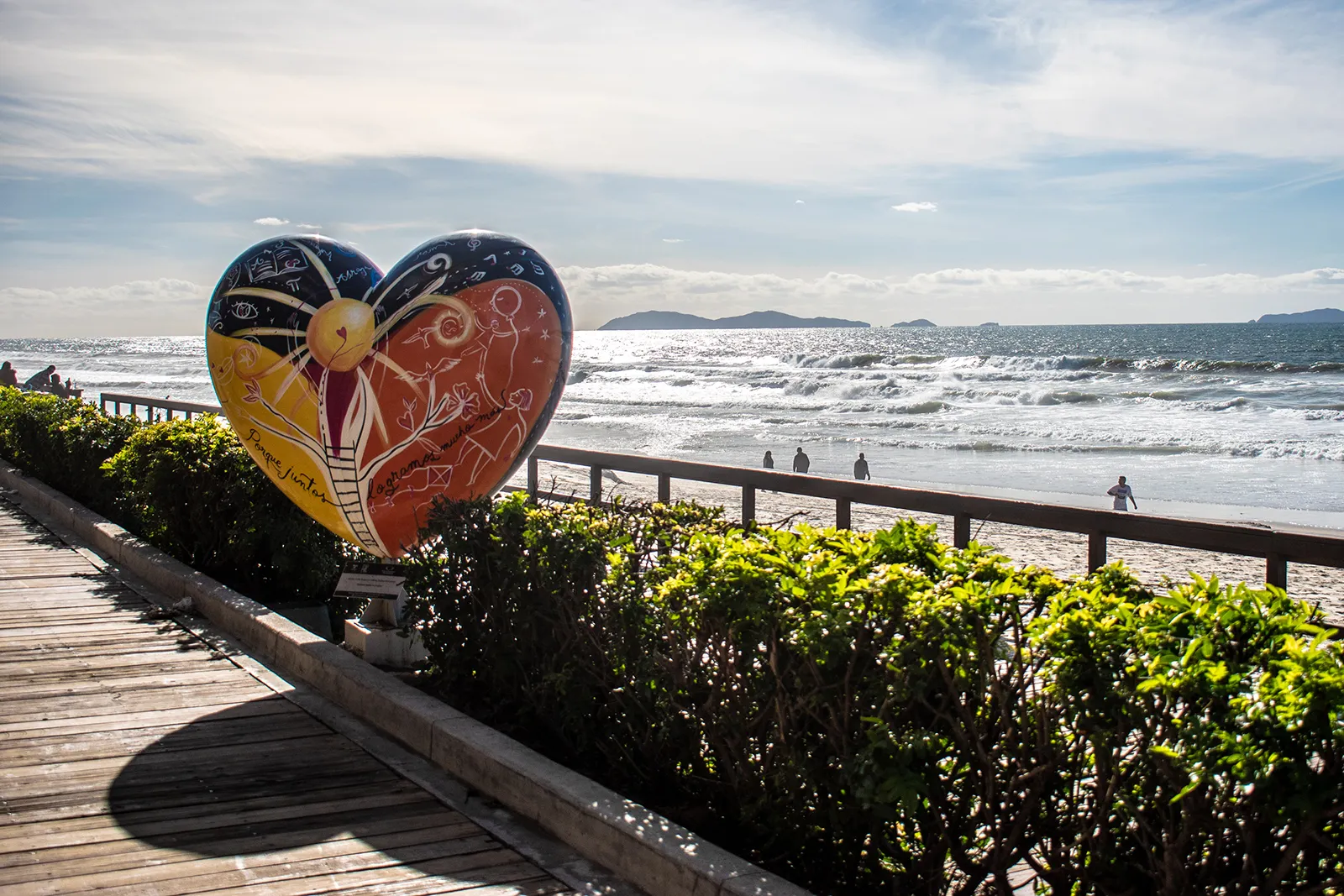 Giant painted heart sculpture on boardwalk in Tijuana, Mexico.