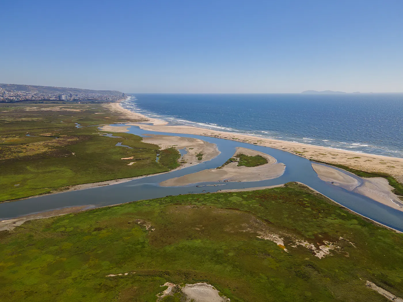 Tijuana River Mouth aerial view with Pacific Ocean.