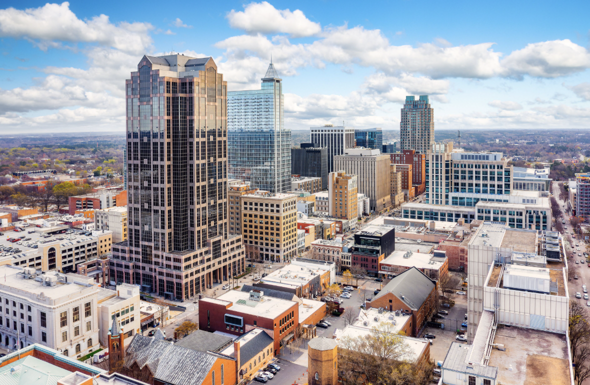 Downtown Raleigh skyline under a blue sky
