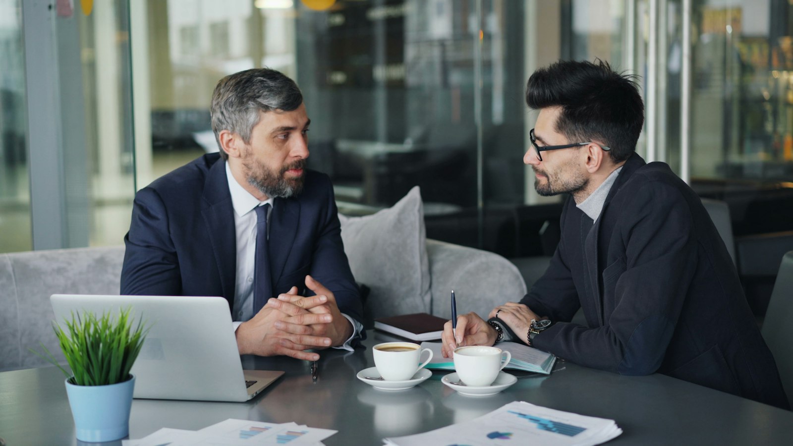 Executives in a private conversation