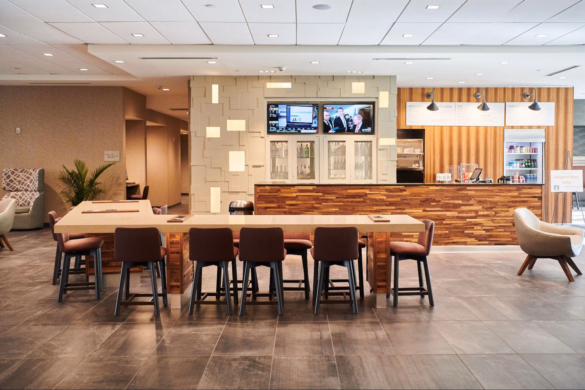 Restaurant interior with tile flooring and pendant lighting