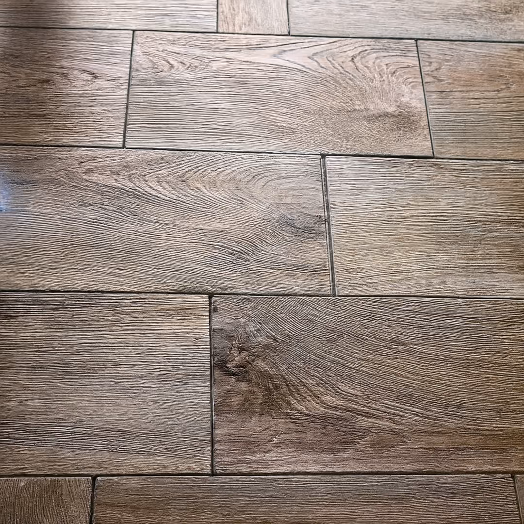Close-up of wood plank flooring showing seams between boards