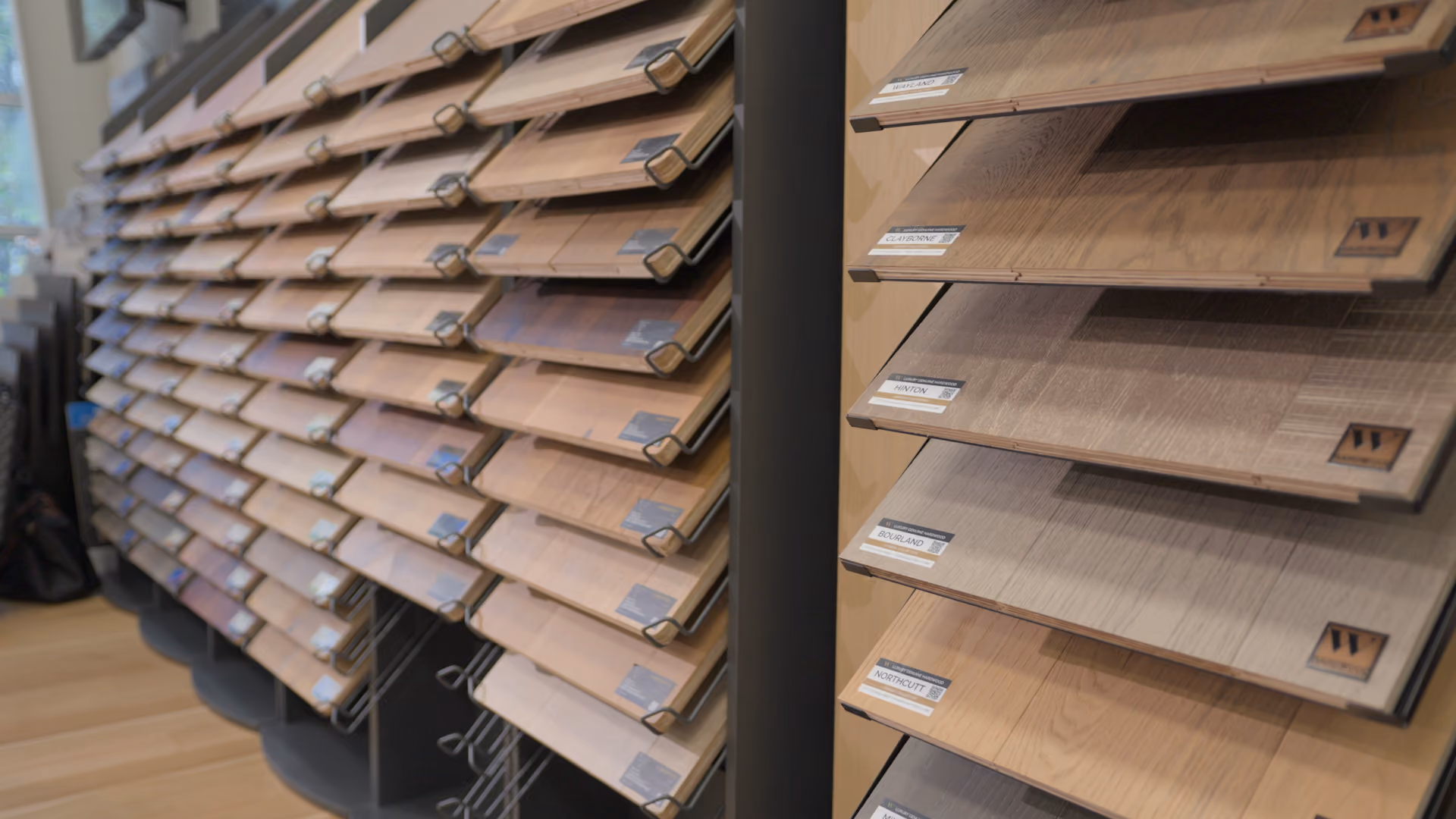 Close-up of stacked wood-look flooring plank samples