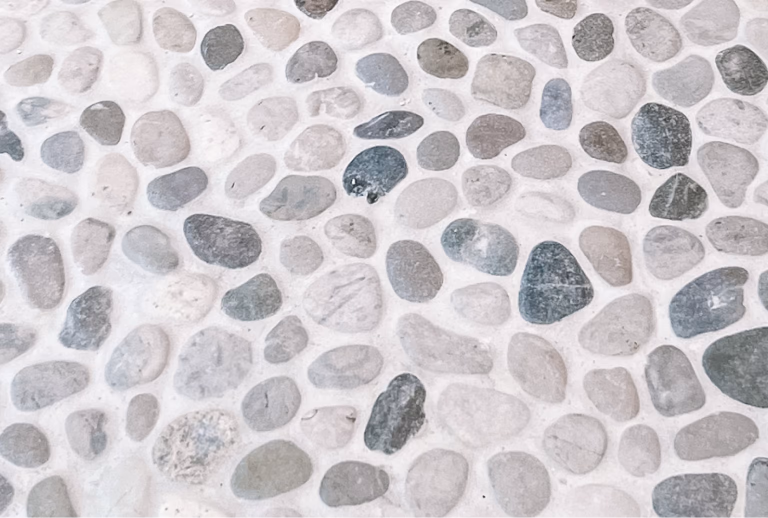 Close-up of natural river rock pebble mosaic tile