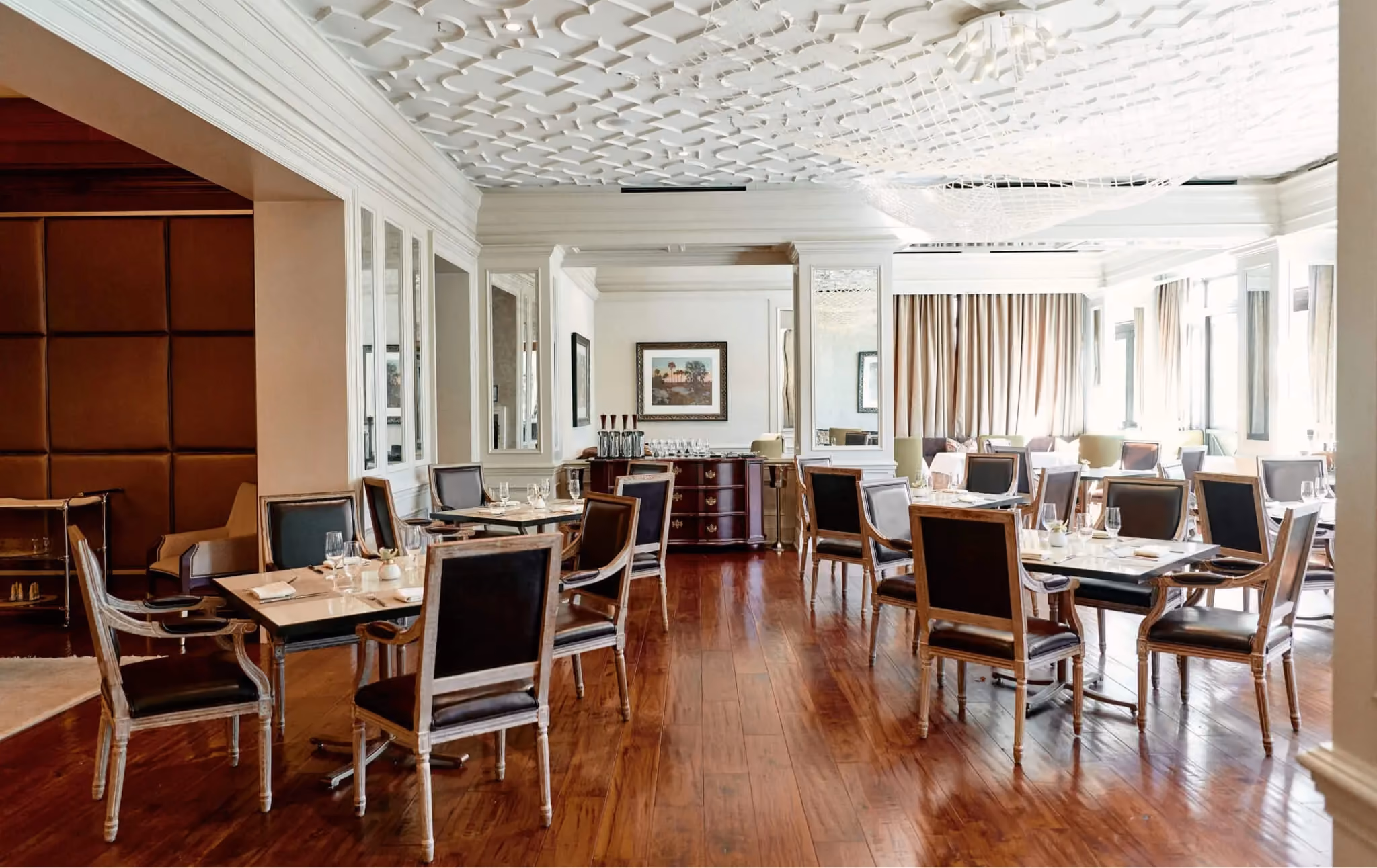 Hotel Bennett dining room with dark hardwood flooring