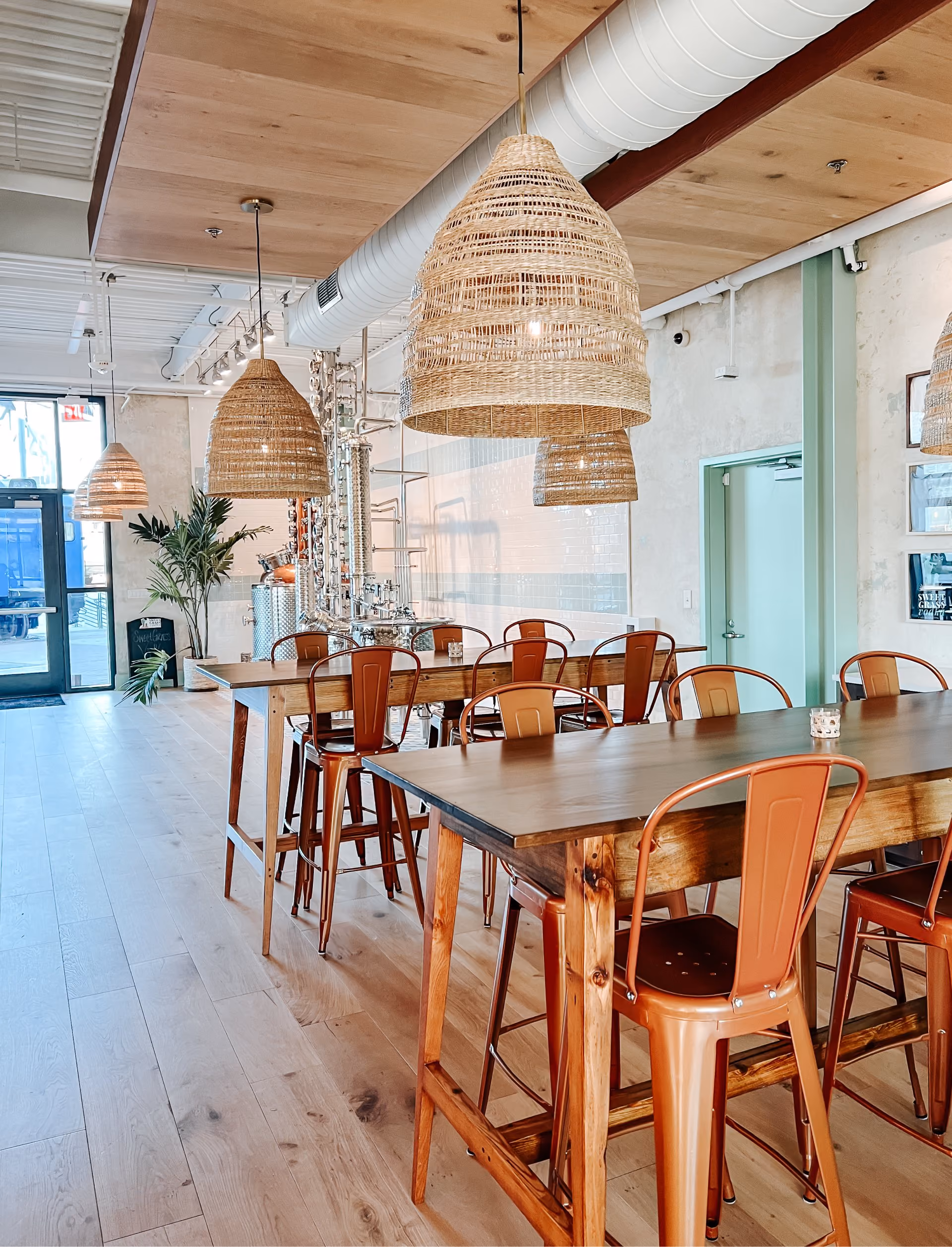 Restaurant dining room with wood tables and hardwood flooring