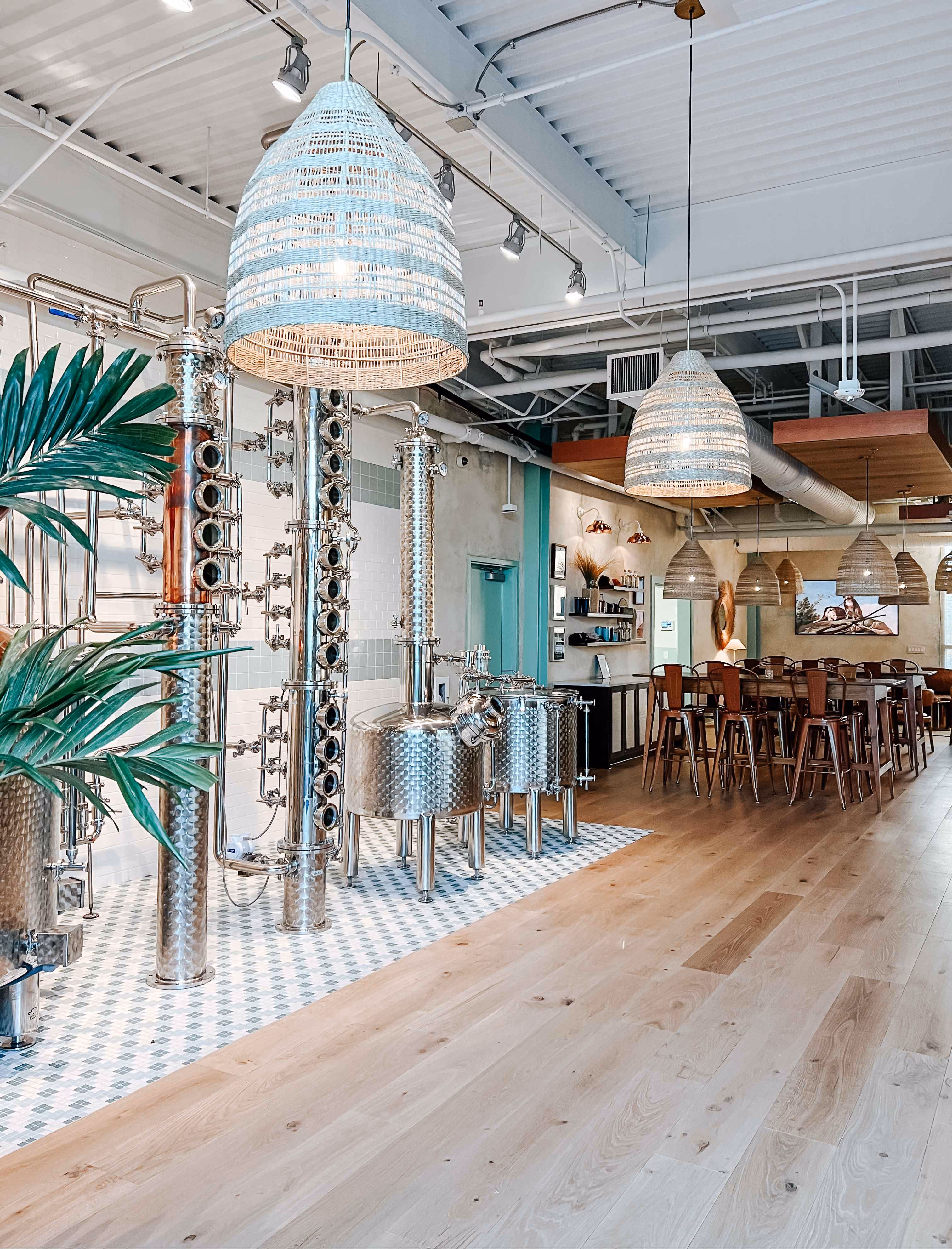 Restaurant dining area with pendant lighting and patterned tile flooring