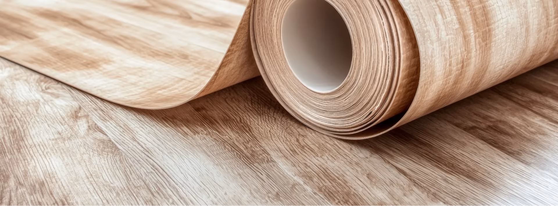 Rolled sheet vinyl flooring sample in a wood-look finish