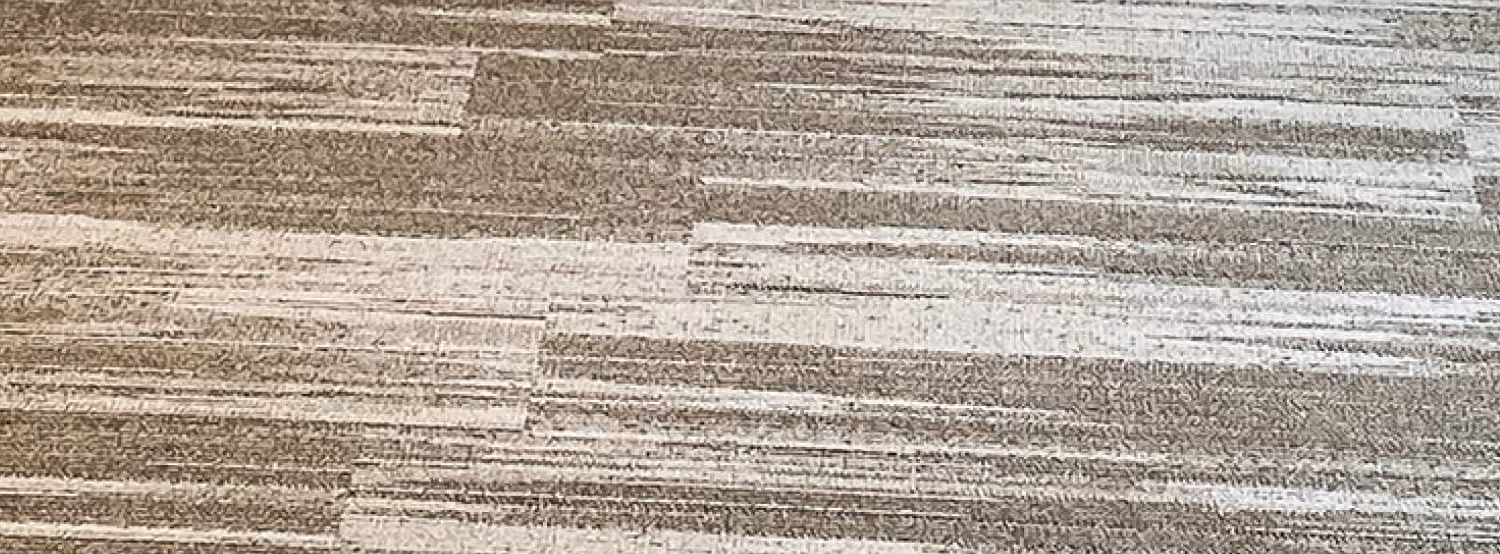 Close-up of textured linear-pattern resilient flooring