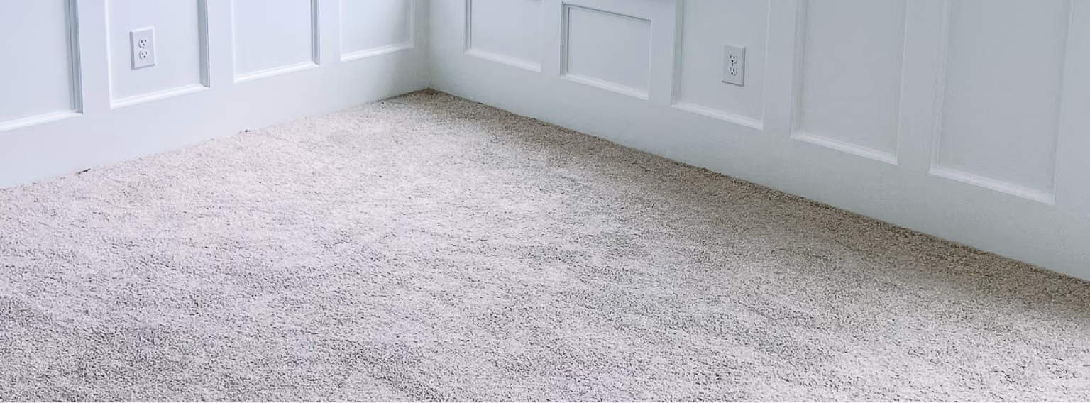 Close-up of light gray speckled carpet tile