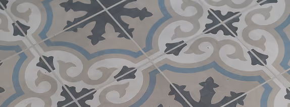 Close-up of blue and white patterned cement-look floor tile