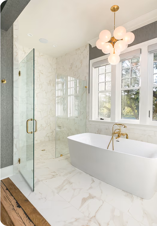 New construction bathroom with a glass shower enclosure and freestanding tub on tile flooring