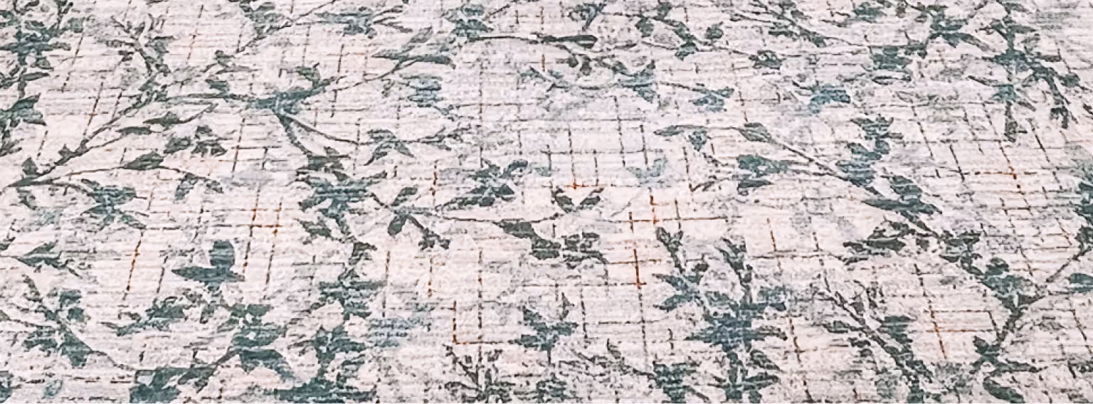 Close-up of gray and white terrazzo-look commercial flooring with linear veining