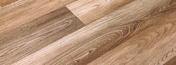 Close-up of medium-tone wood-look plank flooring