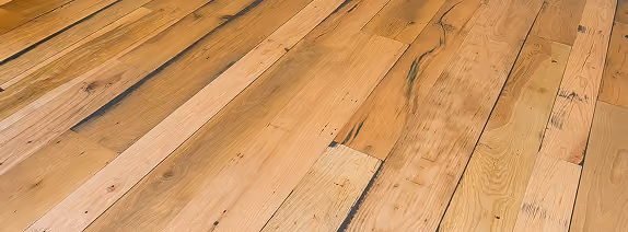 Close-up of honey-toned wood-look plank flooring