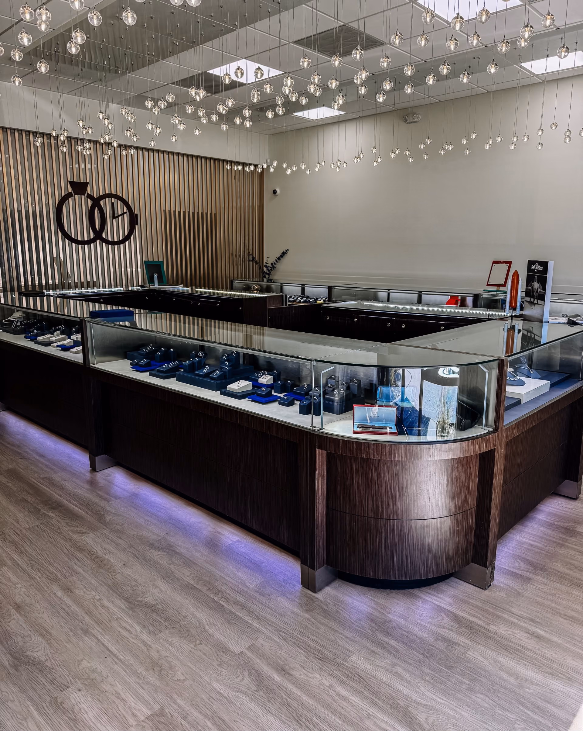 Jewelry store display cases on dark flooring