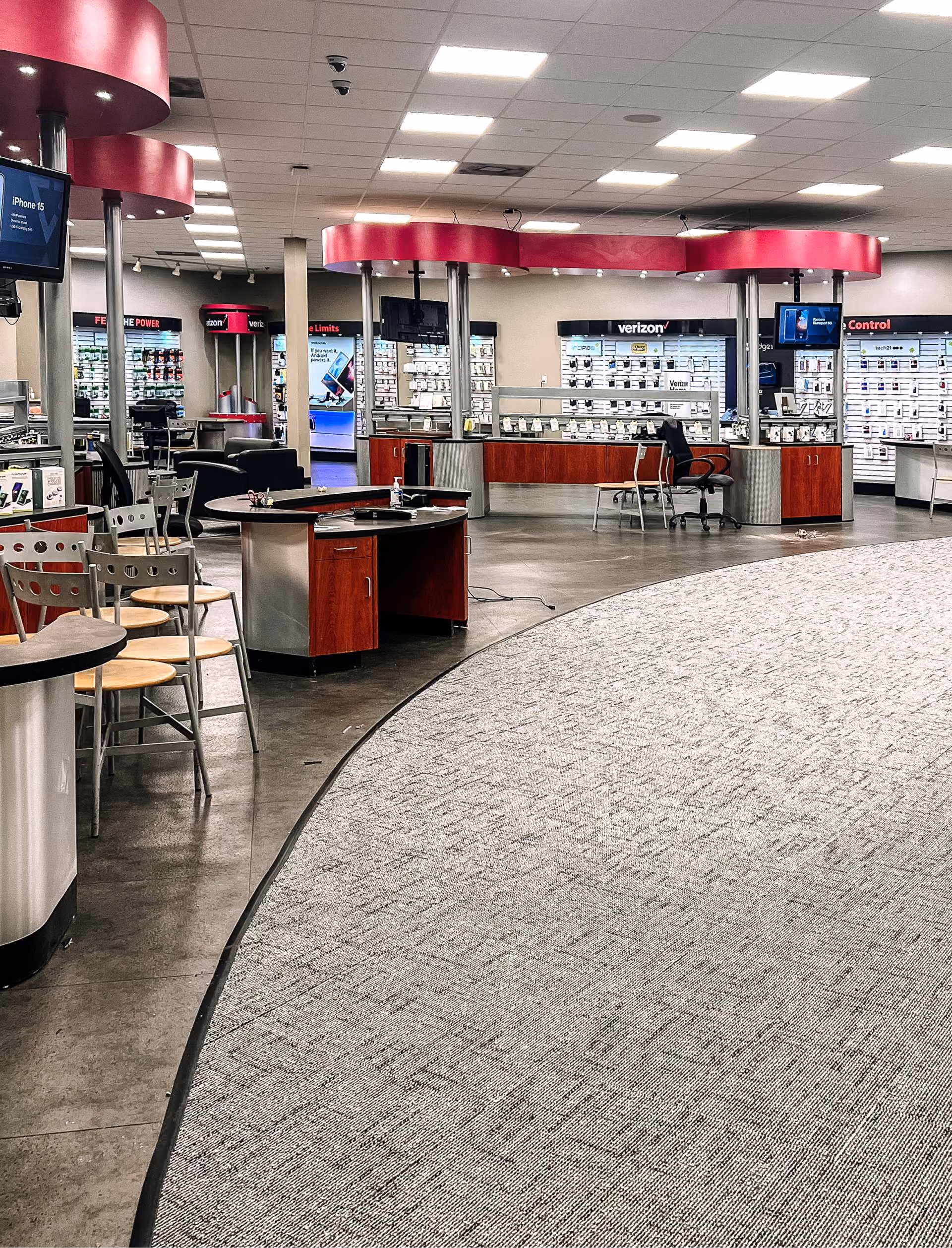 Commercial retail store with speckled terrazzo-look flooring and display shelving