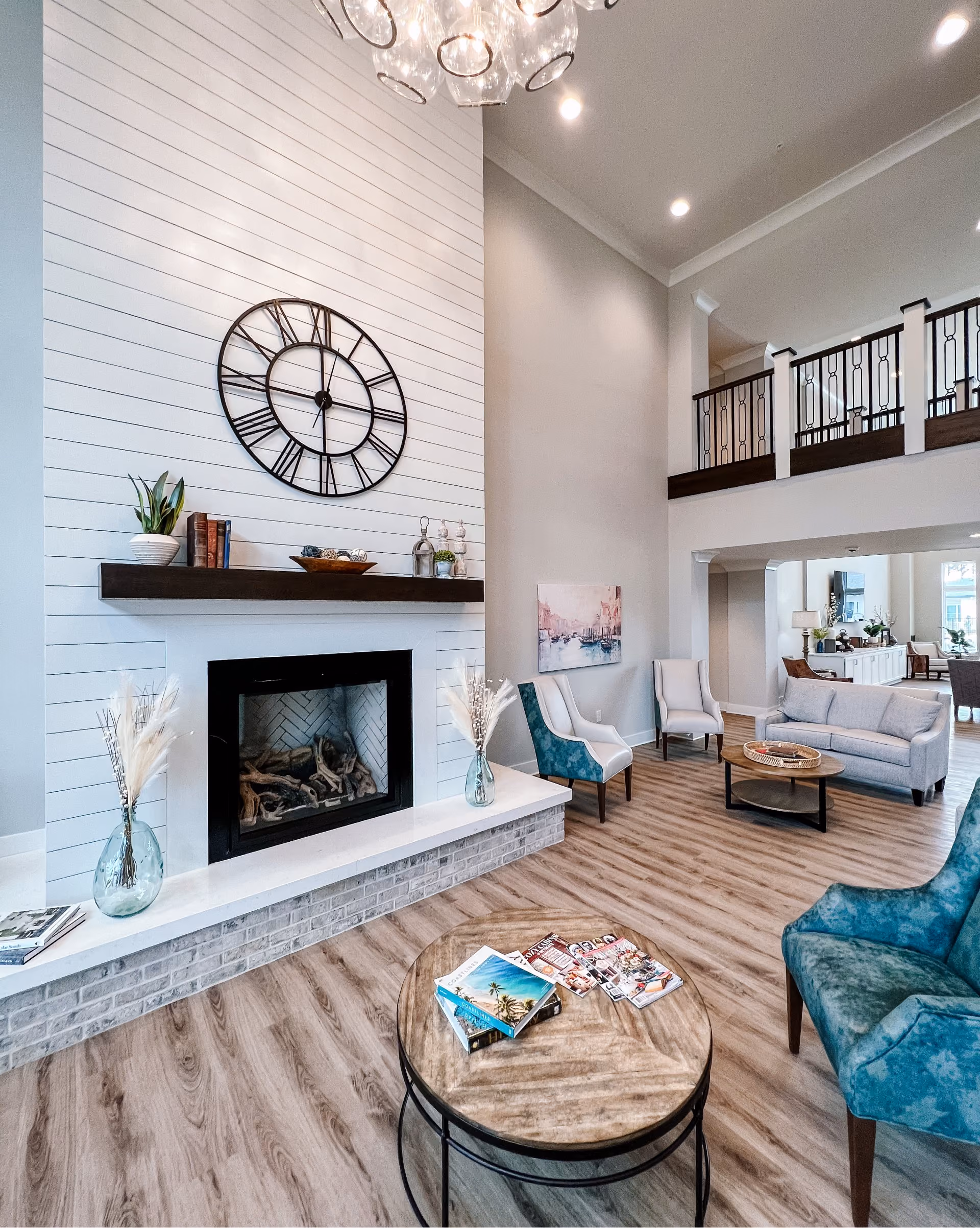 Senior living room with a fireplace and a patterned area rug