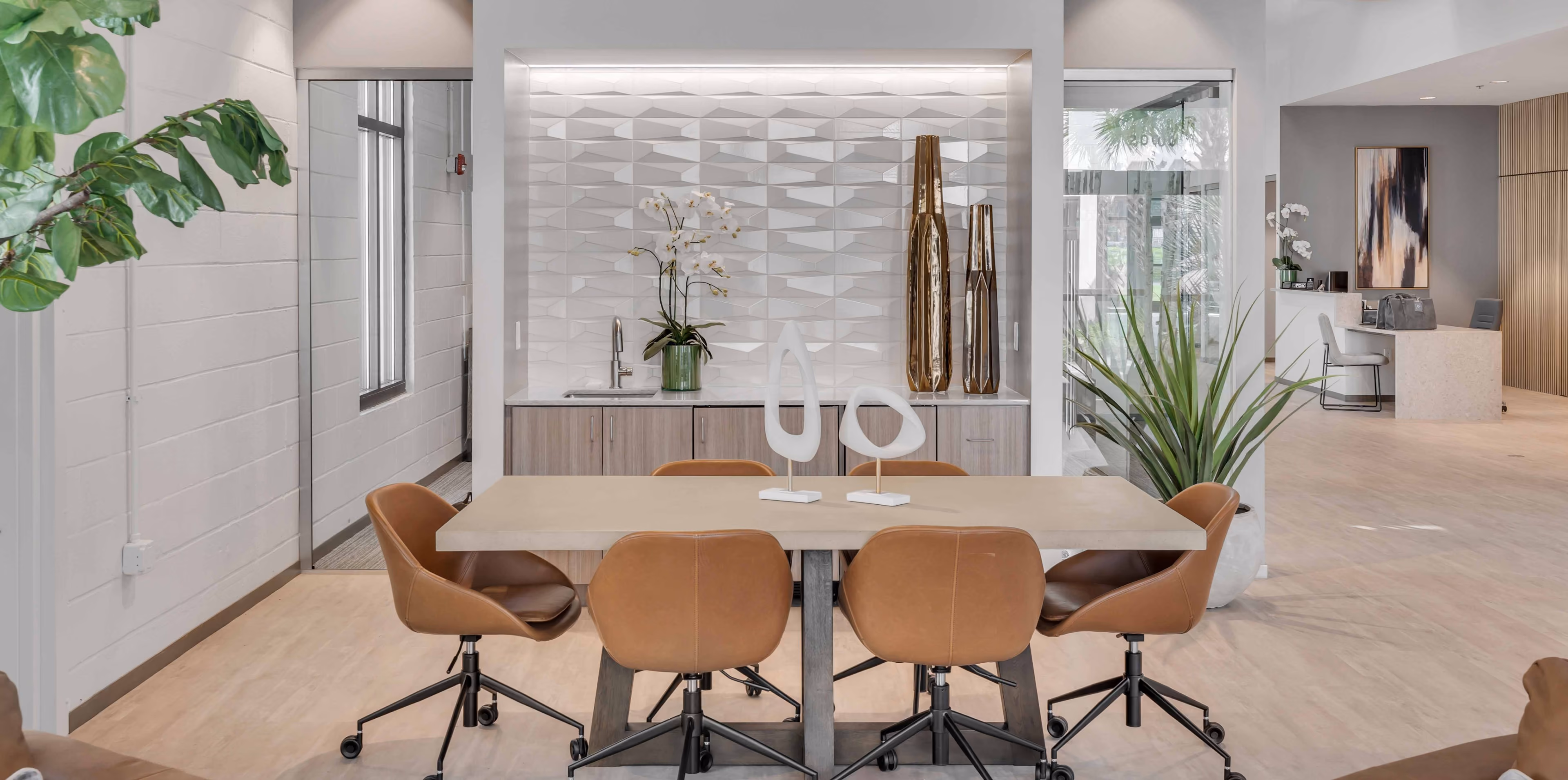 Bank conference room with glass walls and dark patterned carpet flooring