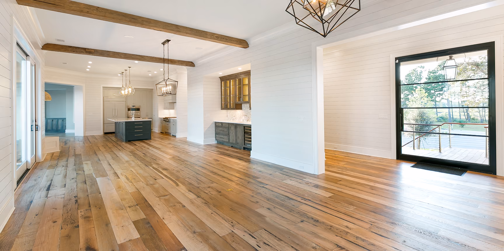Residential living room with hardwood flooring and an open floor plan