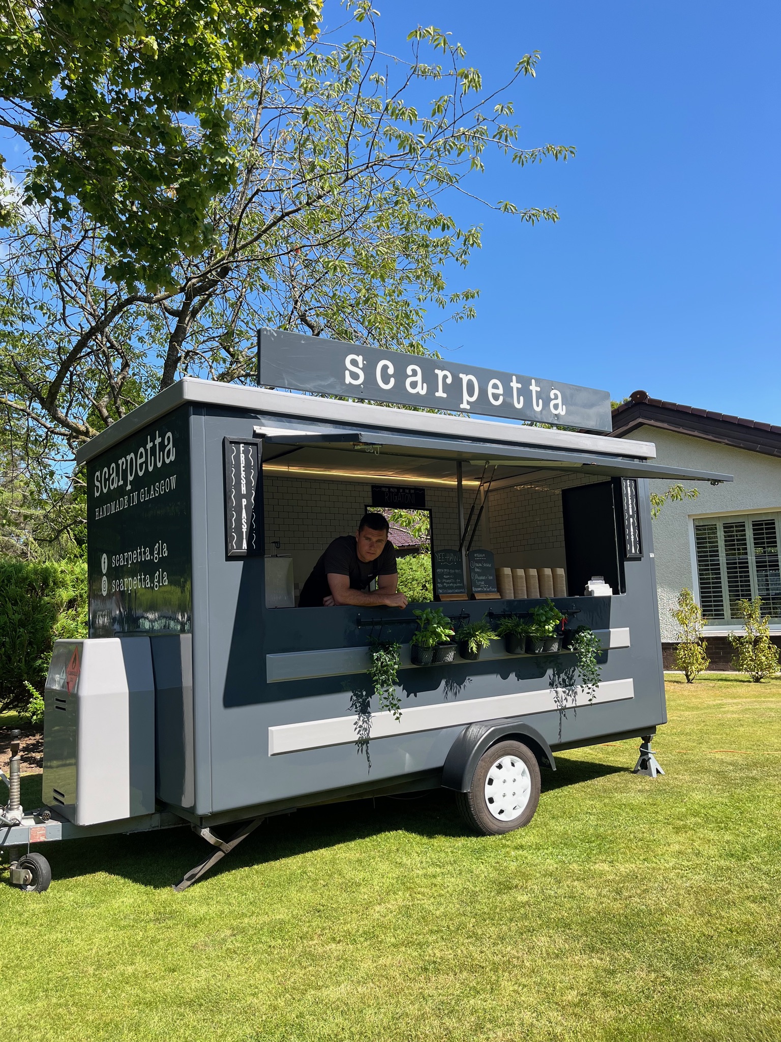 Scarpetta food truck at an outdoor event