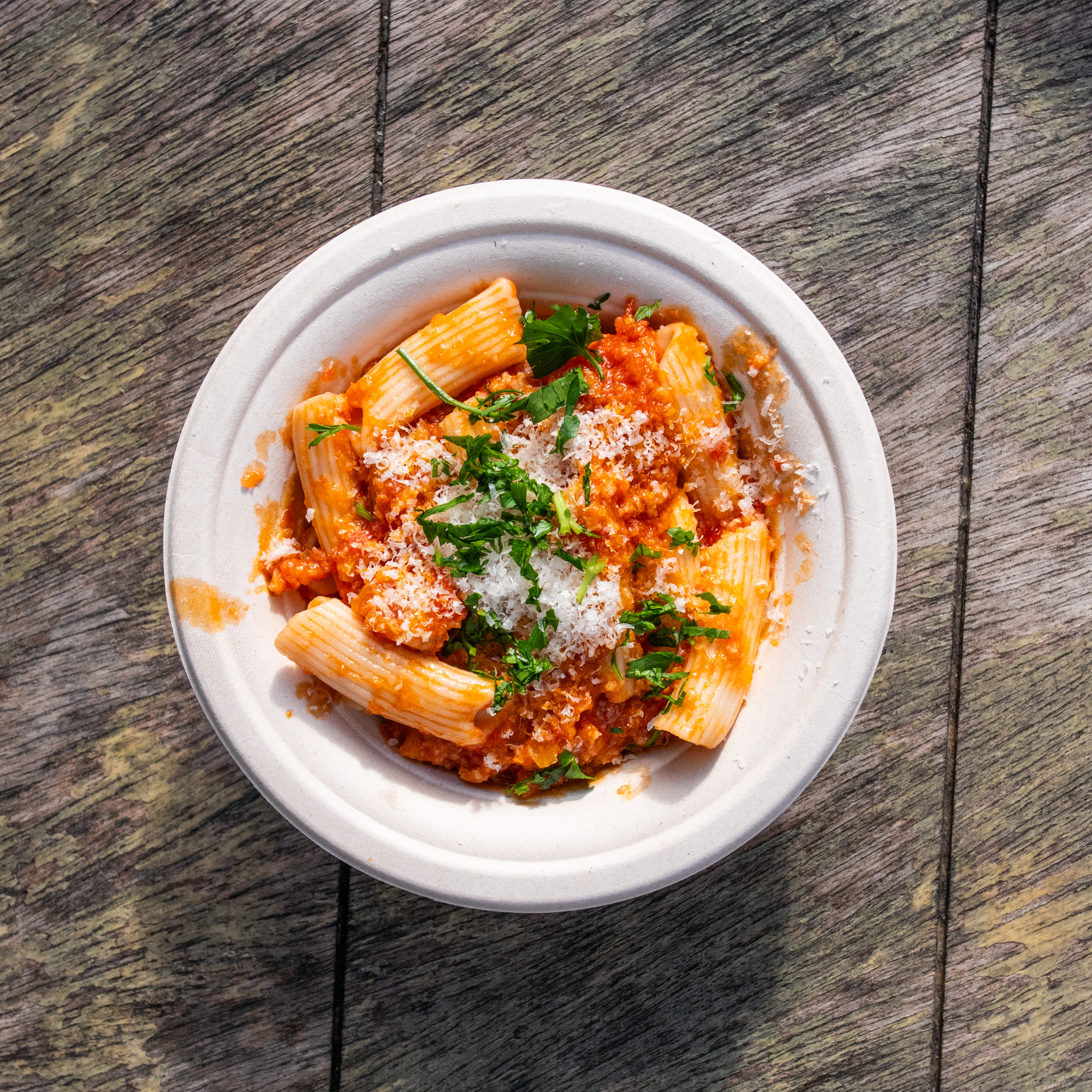 Fresh rigatoni pomodoro with basil