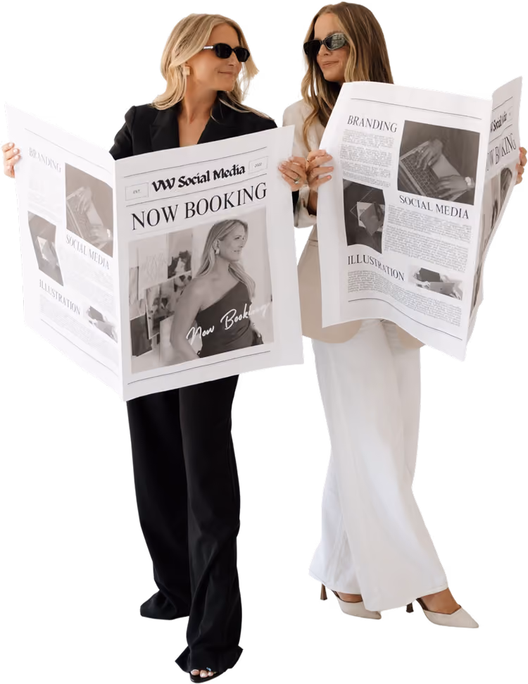 VW Social Media Management team members holding branded content pieces in an editorial studio setting