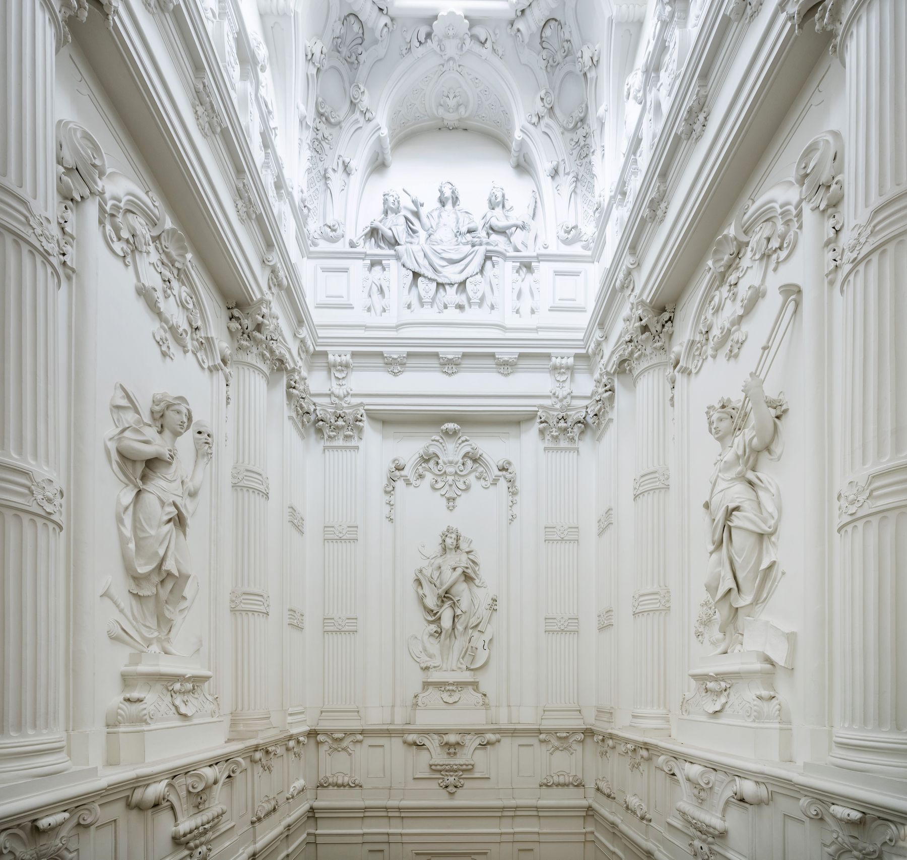 Stucco figures on the wall of the stair hall