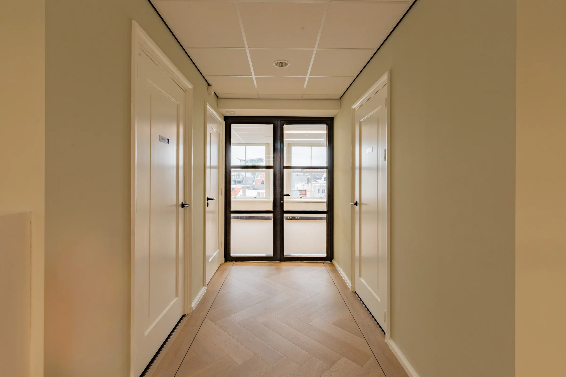 Corridor leading to the canal-side windows
