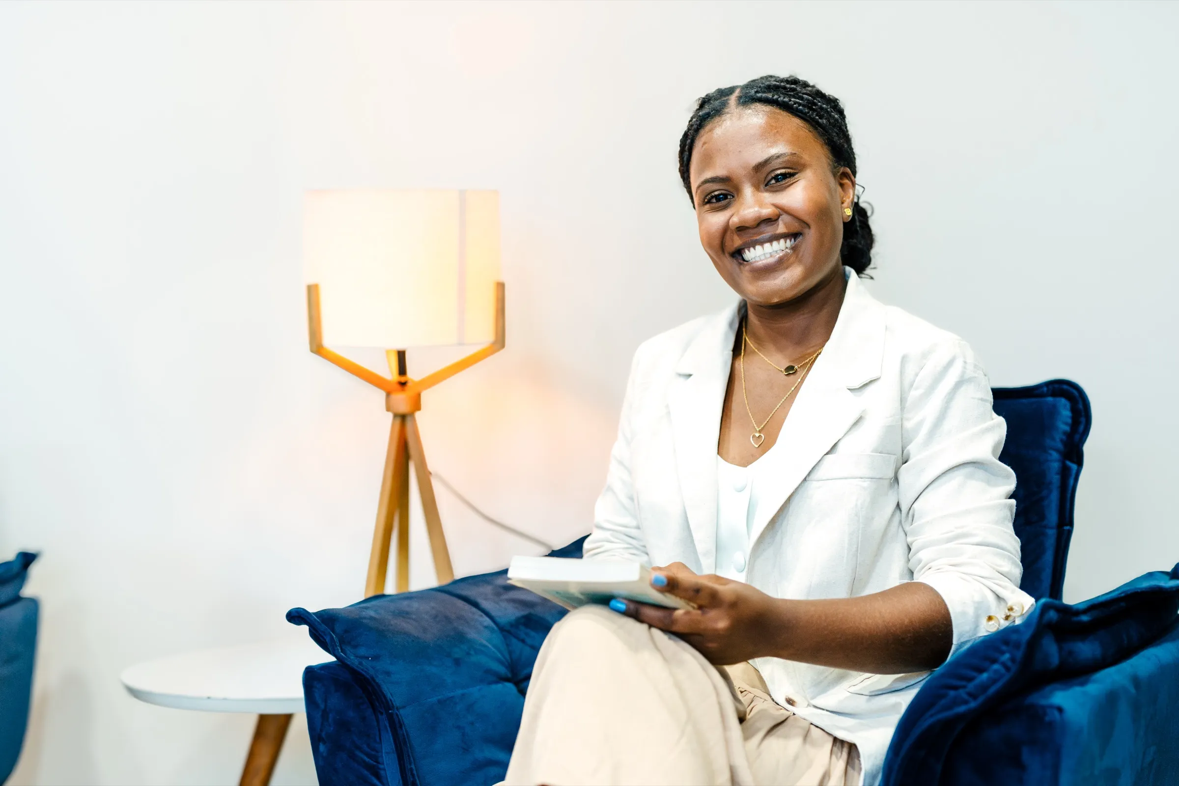 Allied health professional seated in a consultation room