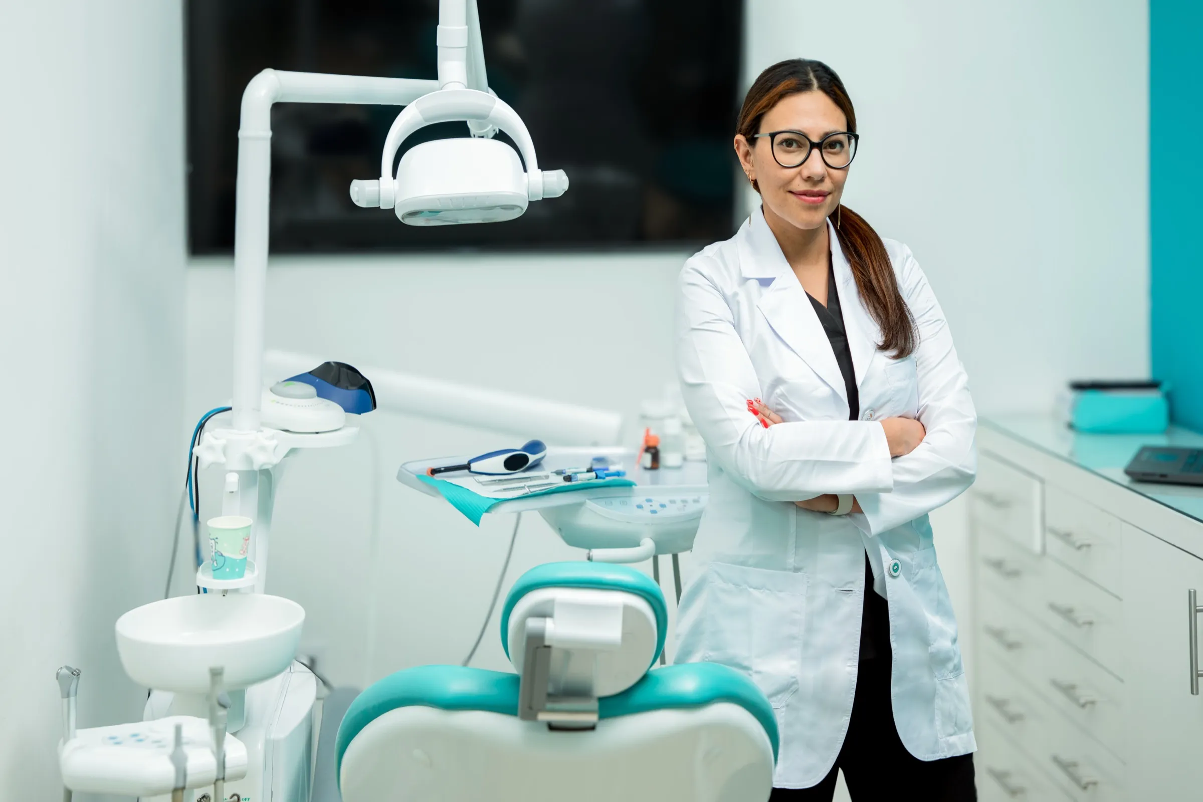 Dentist standing in a dental operatory