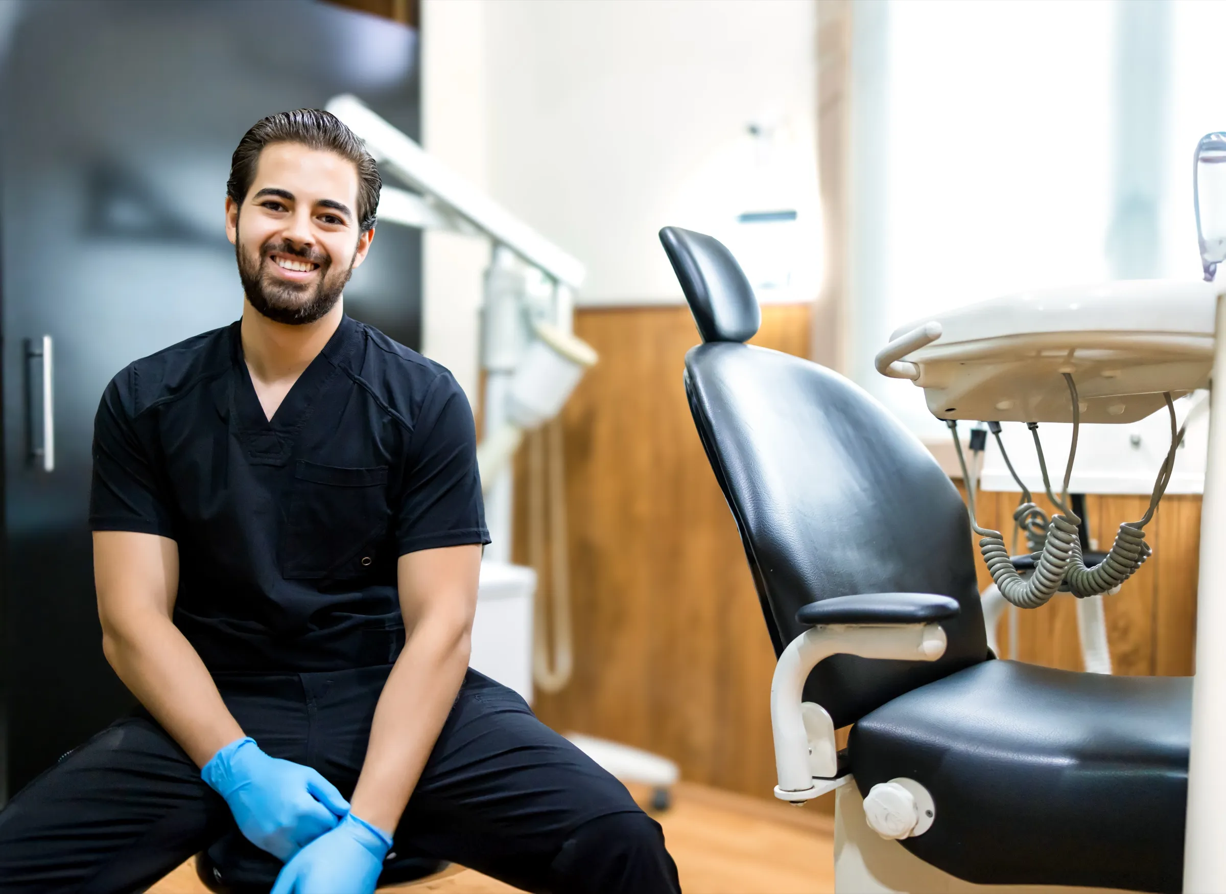 Dentist seated in a dental treatment room