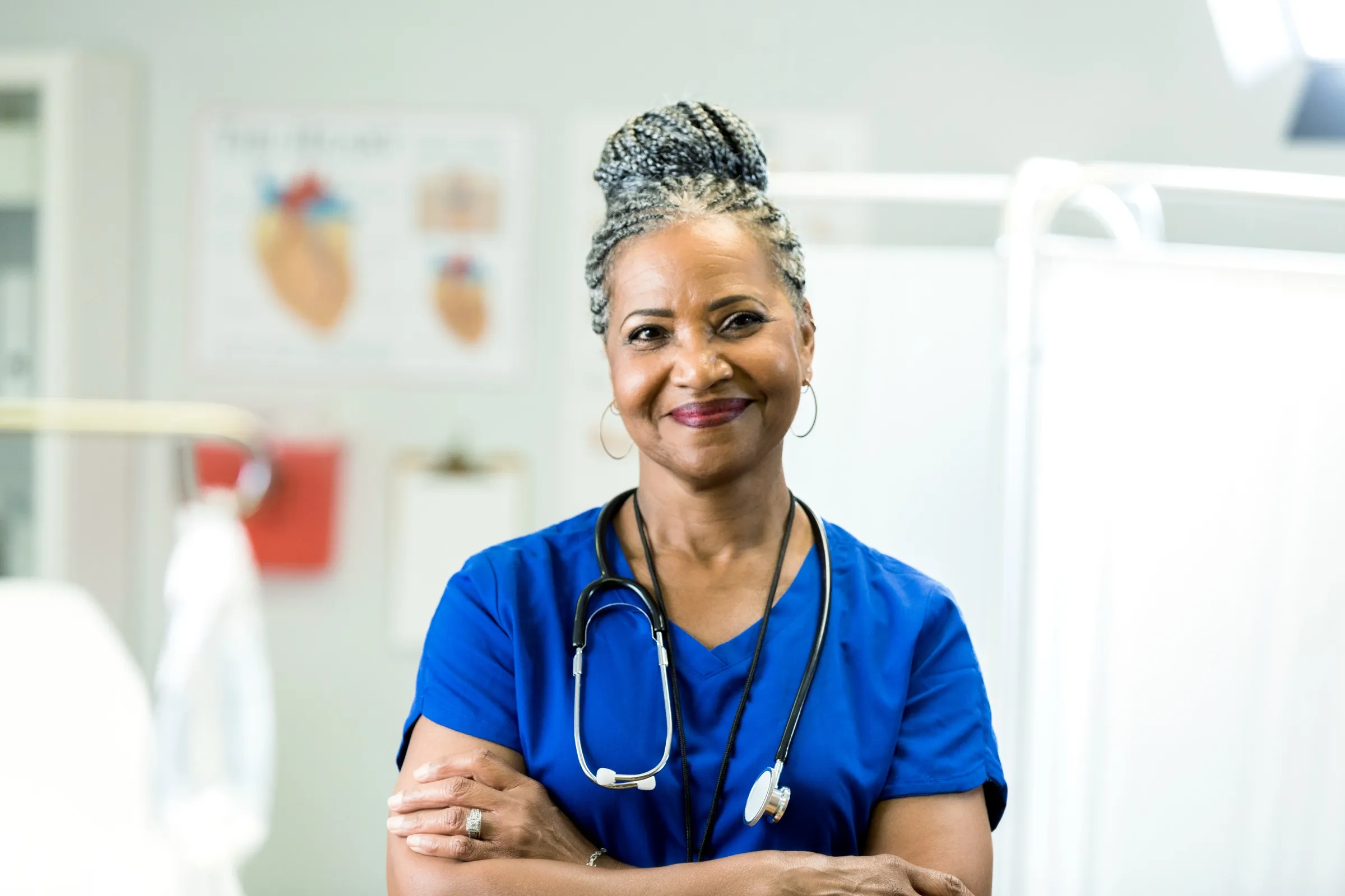 Nurse standing in a clinic exam room