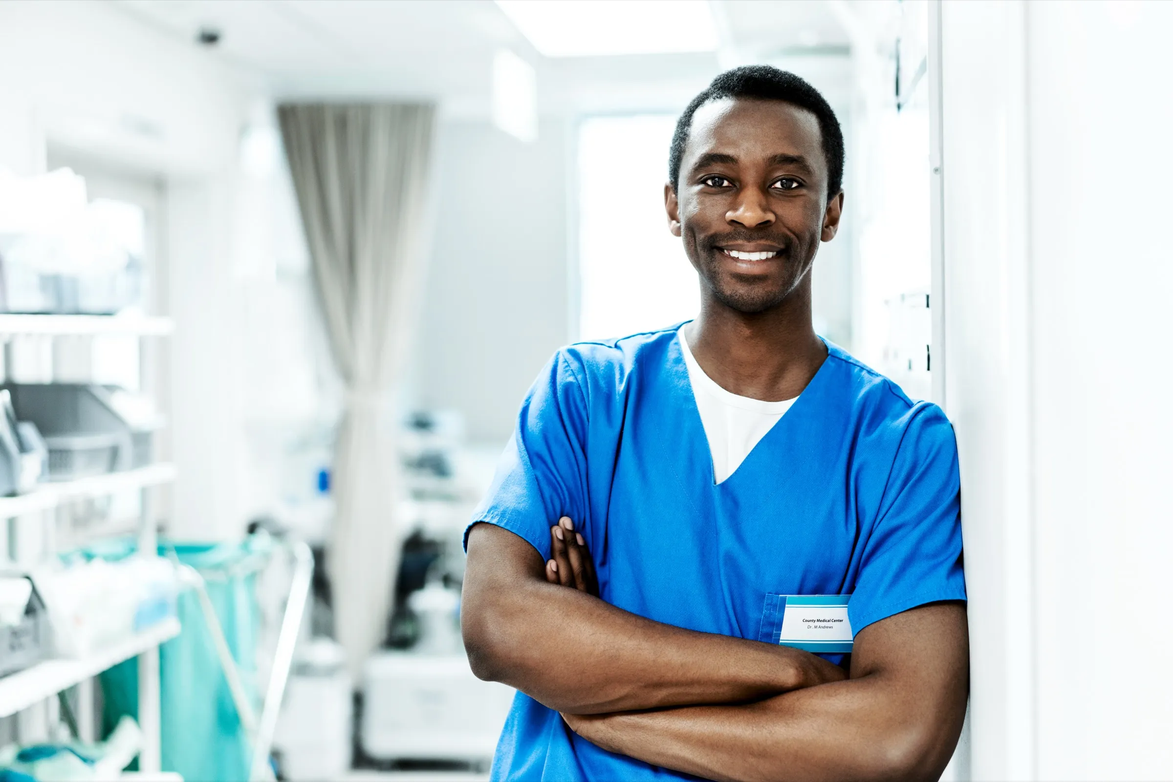 Nurse standing in a clinic corridor