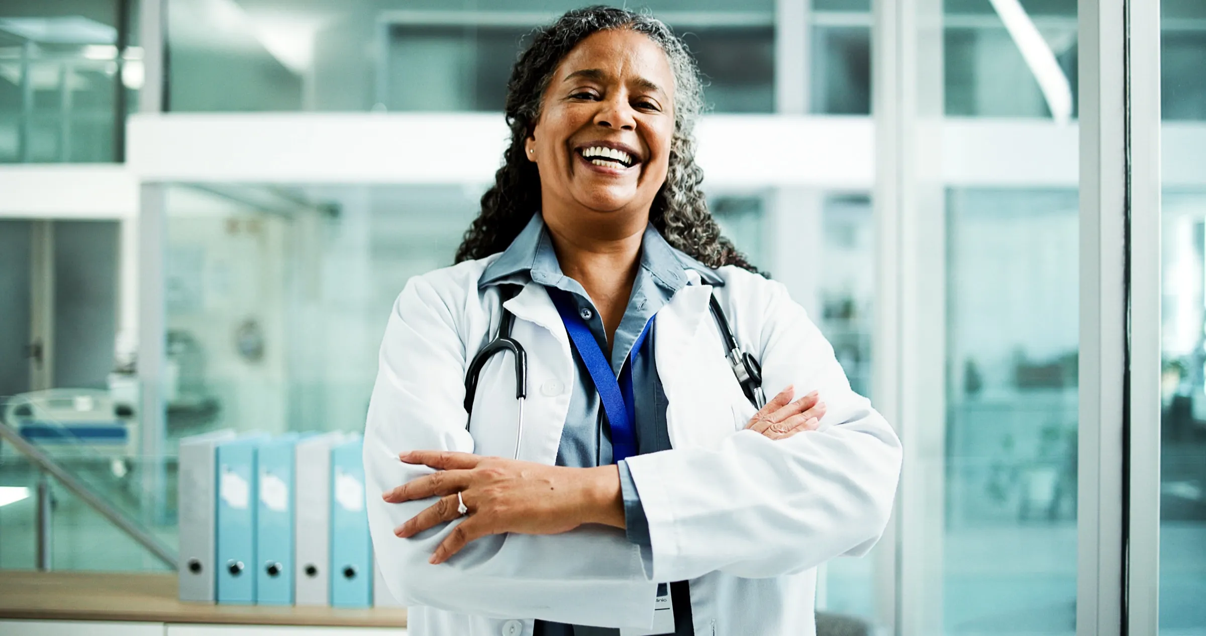 Physician standing in a medical records room