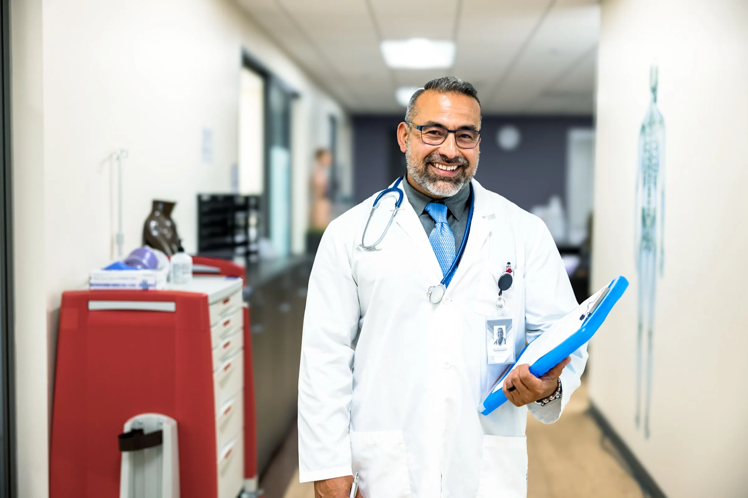 Physician standing in a hospital corridor