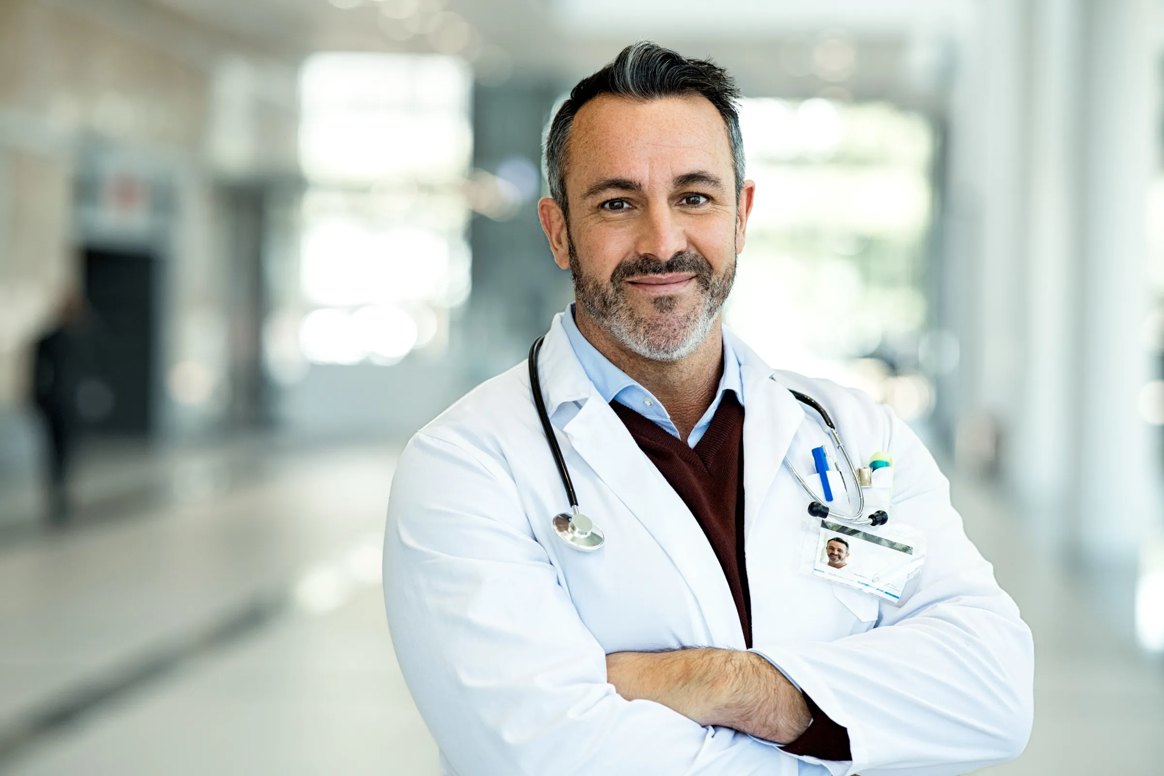 Physician standing in a hospital corridor