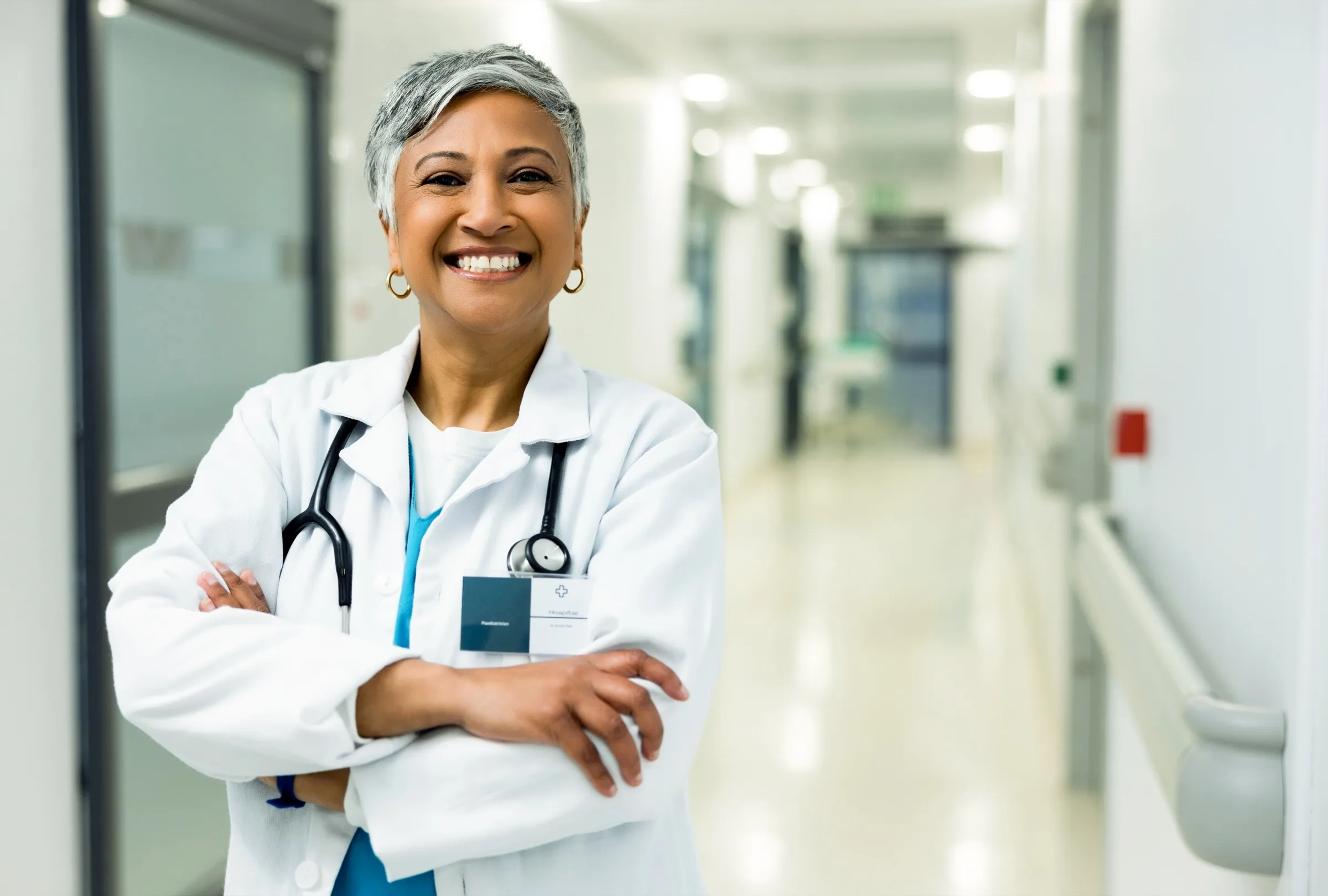 Physician standing in a hospital corridor
