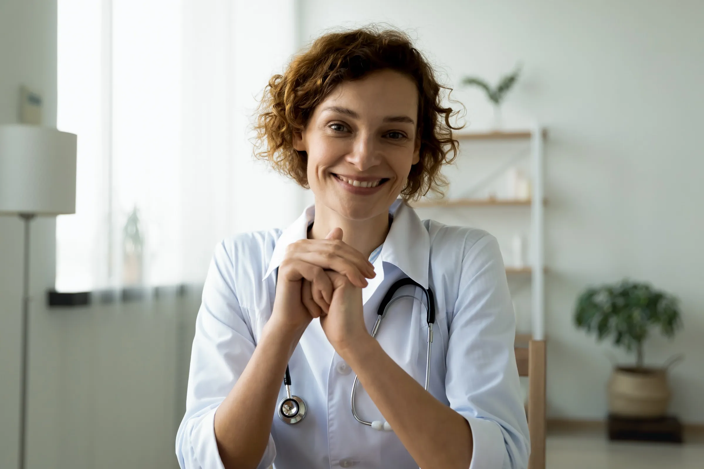 Physician seated in a consultation office