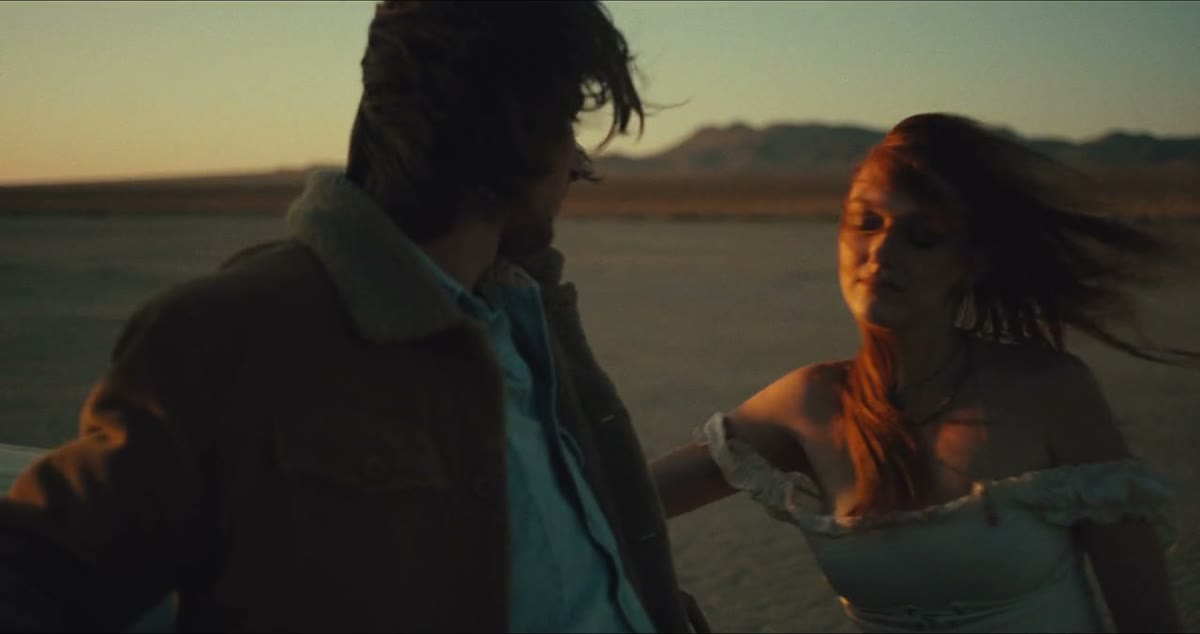 The plate: two people at sunset in the desert