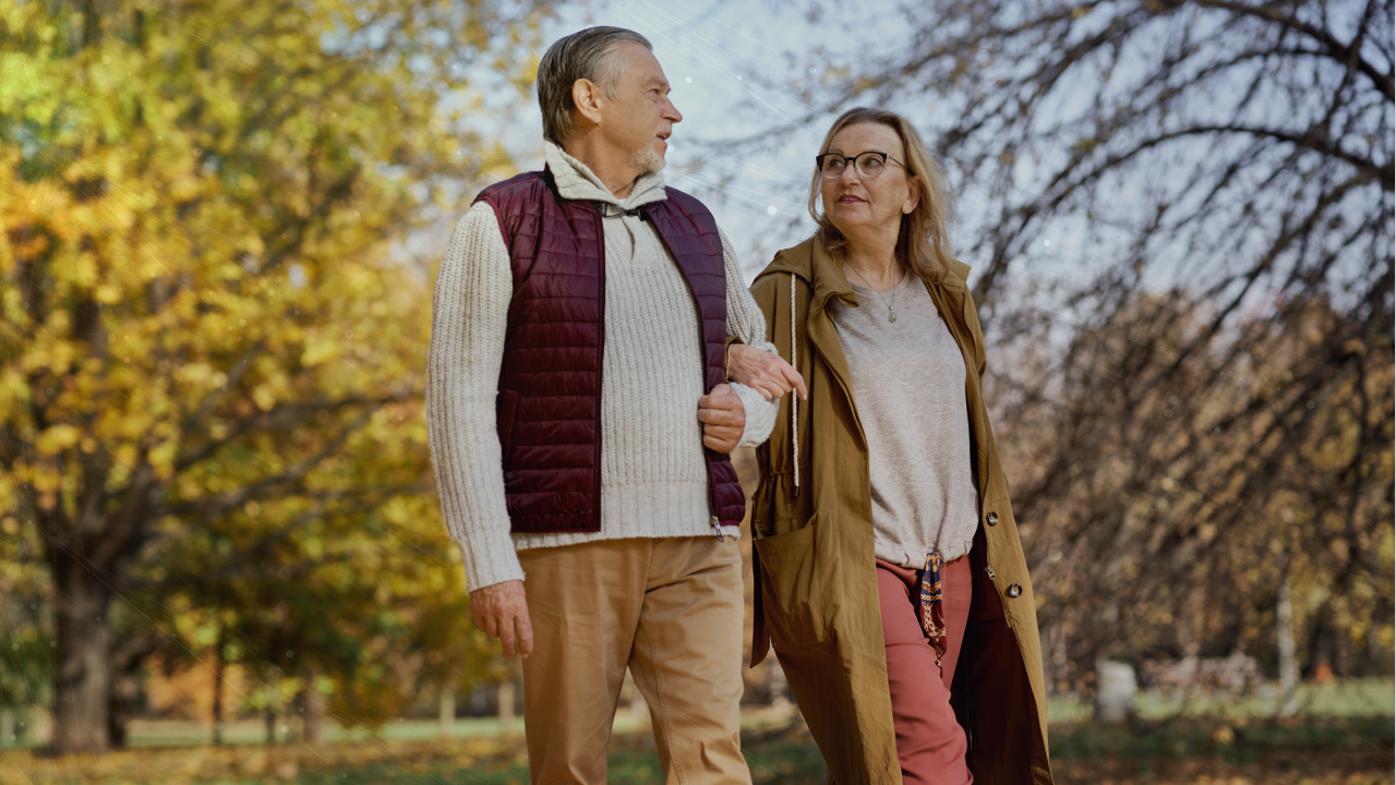 Older couple walking outdoors