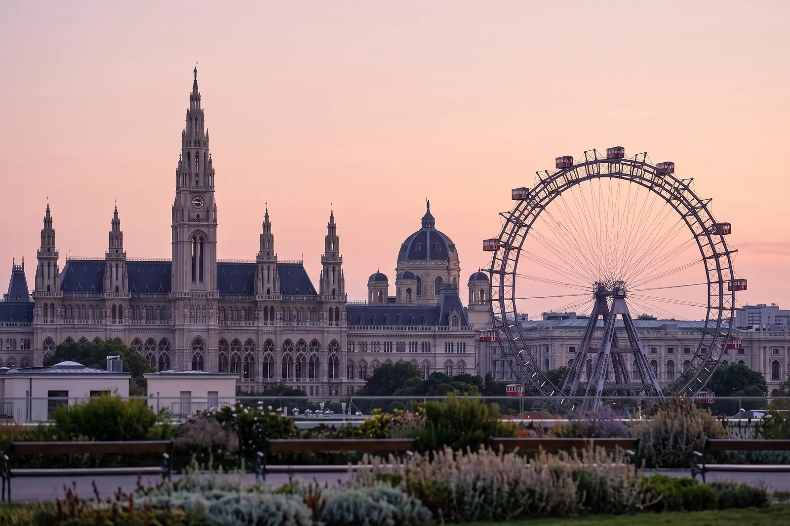 Vienna City Hall and the Giant Ferris Wheel at sunset
