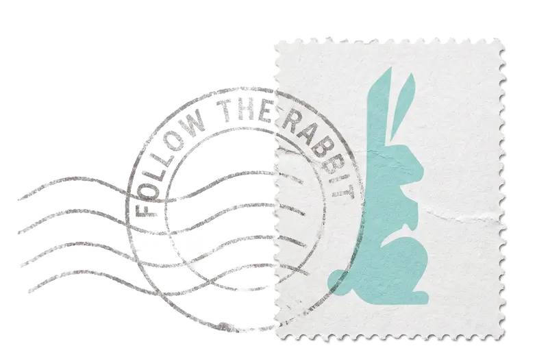 Postzegel met het haas-logo van Studio Symphony en een 'Follow the rabbit' stempel